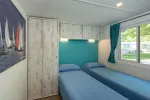 Camping San Francesco Mobile Home Garda Blue Bedroom 