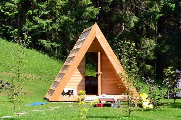 Wooden camping huts in Camping Bled